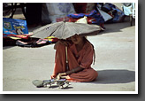 Girl selling Kitchen Utensils